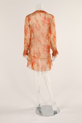 Lot 48 - A pale salmon pink chiffon dress, late 1920s,...