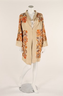 Lot 49 - A late 1920s ivory dress with cutwork bodice,...