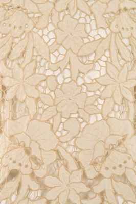 Lot 49 - A late 1920s ivory dress with cutwork bodice,...