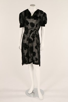 Lot 52 - A 1930s black devor bias cut dress, bust...