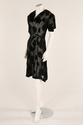 Lot 52 - A 1930s black devor bias cut dress, bust...