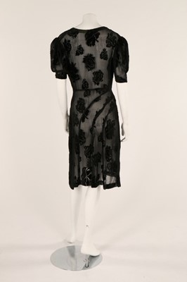 Lot 52 - A 1930s black devor bias cut dress, bust...