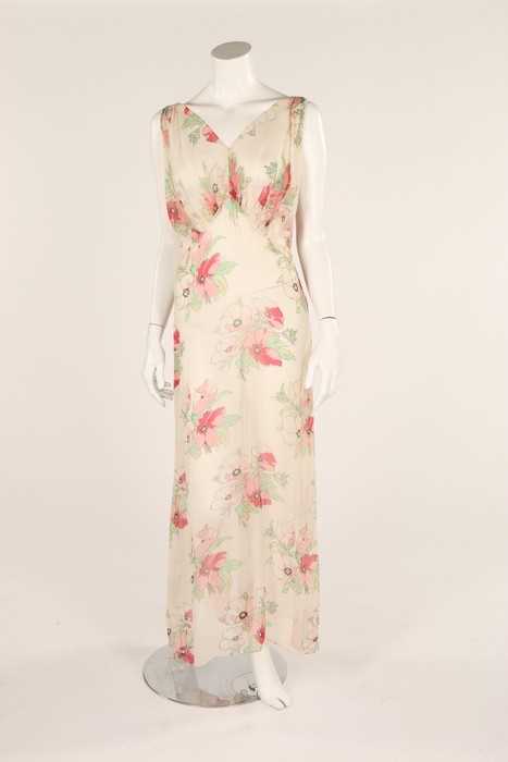 Lot 56 - Two full-length chiffon garden party dresses,...