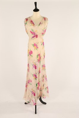 Lot 56 - Two full-length chiffon garden party dresses,...