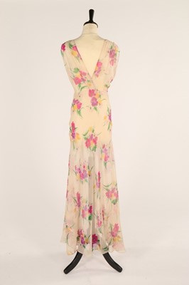 Lot 56 - Two full-length chiffon garden party dresses,...