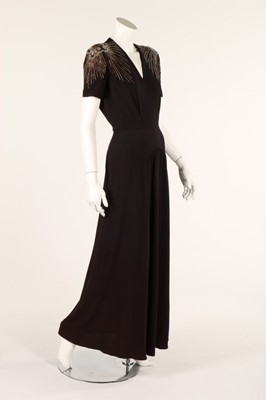 Lot 74 - Two moss crepe dresses, 1940s, one full-length...