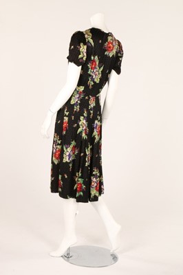Lot 78 - Three 1940s dinner dresses, one of textured...