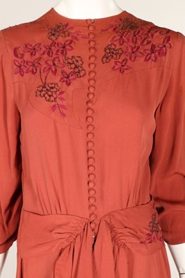 Lot 78 - Three 1940s dinner dresses, one of textured...