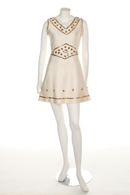 Lot 133 - A Courrèges couture white satin and gold...