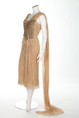 Lot 357 - An Alexander McQueen beige chiffon cocktail...