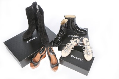 Lot 148 - Four pairs of Chanel shoes, 2000s-modern,...