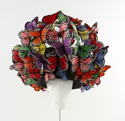 Lot 292 - A Philip Treacy painted feather 'butterfly'...