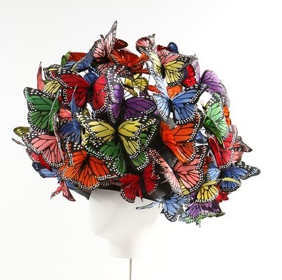 Lot 292 - A Philip Treacy painted feather 'butterfly'...