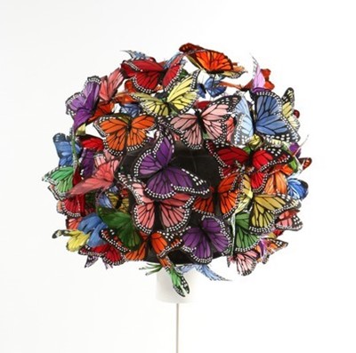 Lot 292 - A Philip Treacy painted feather 'butterfly'...