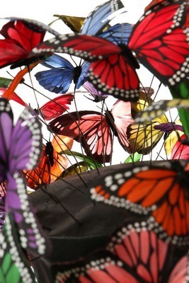 Lot 292 - A Philip Treacy painted feather 'butterfly'...