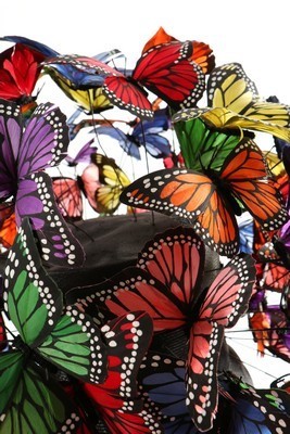 Lot 292 - A Philip Treacy painted feather 'butterfly'...