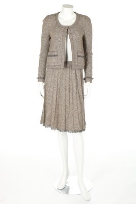 Lot 293 - A Chanel couture flecked tan tweed suit, circa...