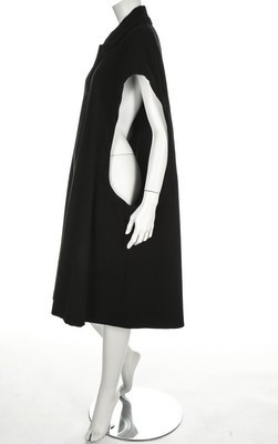 Lot 320 - A Yohji Yamamoto black wool cape, in homage to...