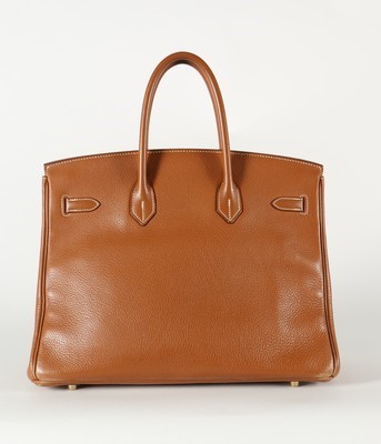 Lot 5 - An Hermès tan leather Birkin, 2007, blind...