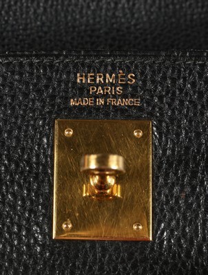 Lot 17 - An Hermès soft black leather Kelly, 1999,...