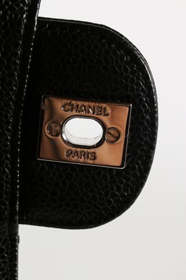 Lot 4 - A Chanel black caviar leather double flap bag,...