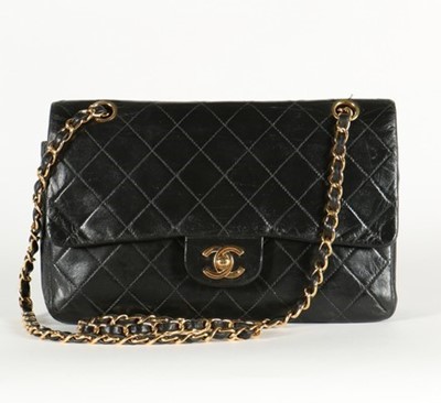 Lot 14 - A Chanel quilted black leather 2.55 bag, 1985,...