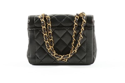 Lot 1 - A Chanel black quilted leather bag, 1990s,...