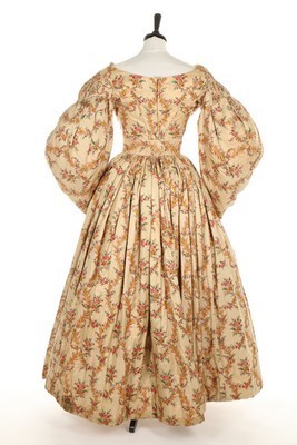 Lot 45 - A printed silk dress, circa 1836, with gigot...
