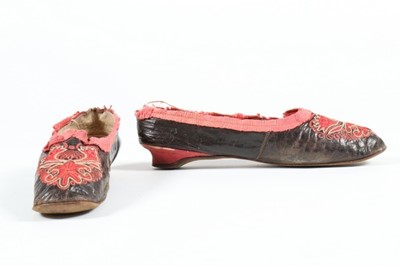 Lot 55 - A pair of glac leather pumps and two single...