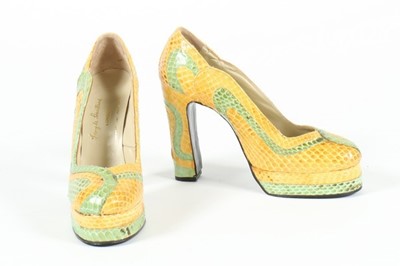 Lot 136 - A pair of Terry de Havilland yellow and green...