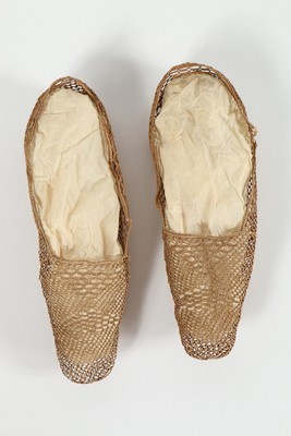 Lot 51 - A pair of woven vegetable fibre summer shoes,...