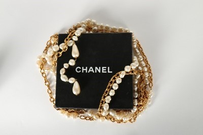 Lot 18 - A fine Chanel triple strand chain linked and...