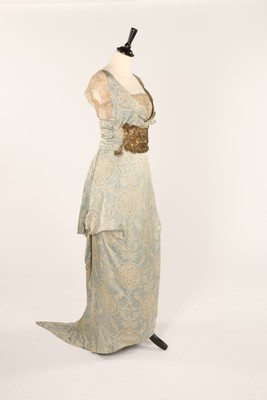 Lot 64 - A Doeuillet blue and gold brocaded satin...