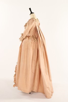 Lot 42 - An old-rose silk robe à la Française, 1770s,...
