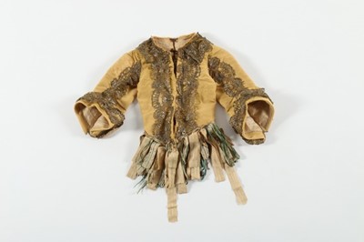 Lot 38 - A yellow silk jacket trimmed with metal lace,...