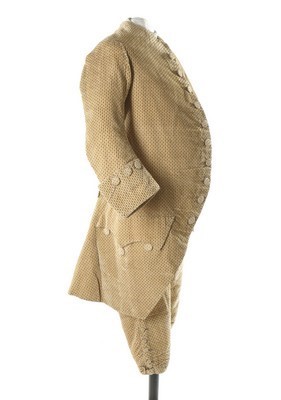 Lot 29 - A sprigged mustard velvet gentleman's suit,...