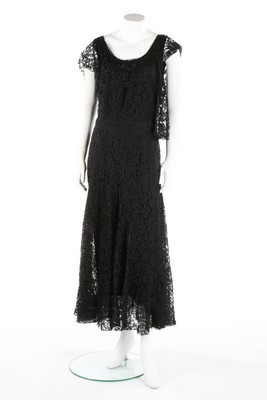 Lot 91 - A Chanel couture bias-cut black lace dress,...