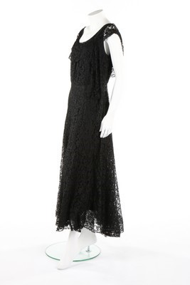 Lot 69 - A Chanel couture bias-cut lace 'little black'...