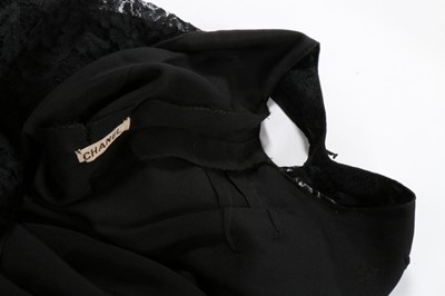 Lot 69 - A Chanel couture bias-cut lace 'little black'...