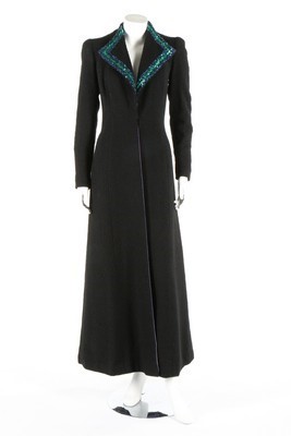 Lot 87 - A rare Schiaparelli black Linton tweed coat,...