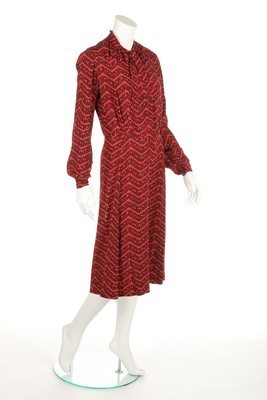 Lot 88 - A Schiaparelli printed silk day dress,...