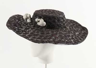 Lot 86 - A rare Schiaparelli painted straw hat, 'Pagan'...
