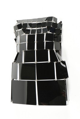 Lot 304 - A Paco Rabanne couture black perspex cocktail...