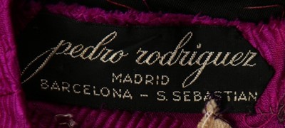 Lot 103 - A Pedro Rodriguez couture magenta cannel satin...