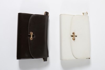 Lot 57 - Two Gucci handbags, late 1960s, in white and...