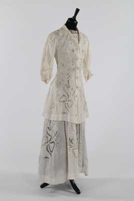 Lot 96 - A broderie anglaise linen summer dress and...