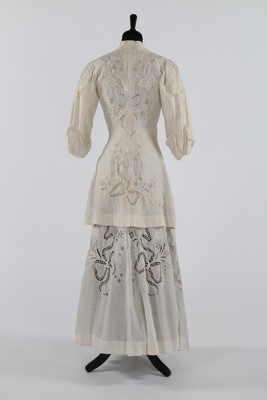 Lot 96 - A broderie anglaise linen summer dress and...