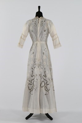 Lot 96 - A broderie anglaise linen summer dress and...