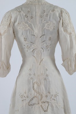 Lot 96 - A broderie anglaise linen summer dress and...