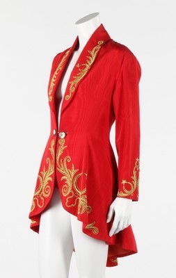 Lot 105 - A Rifat Ozbek red moire tailcoat, late 1980s,...